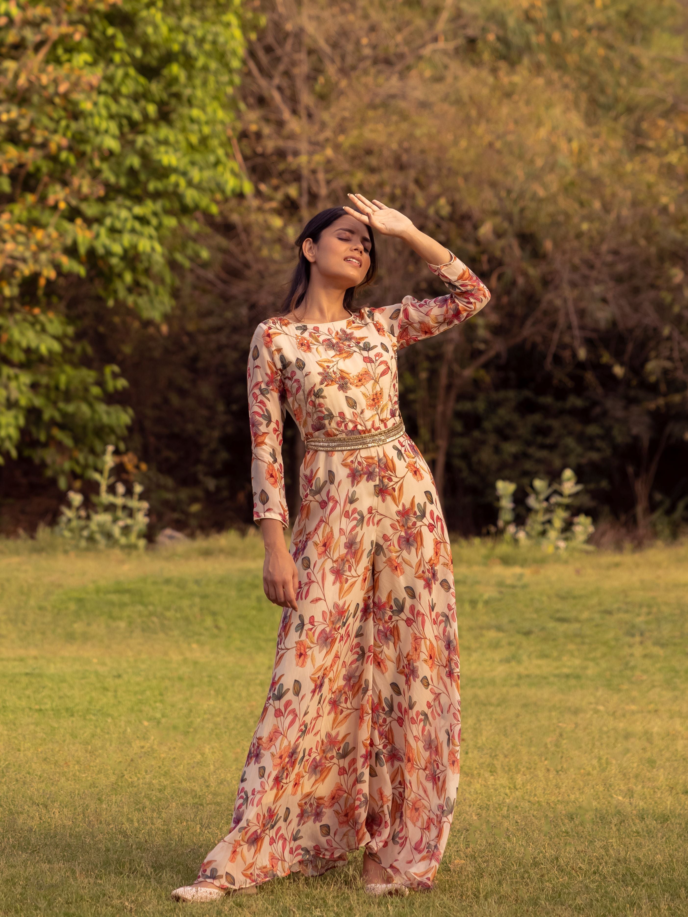 Floral jumpsuit with embroidered belt