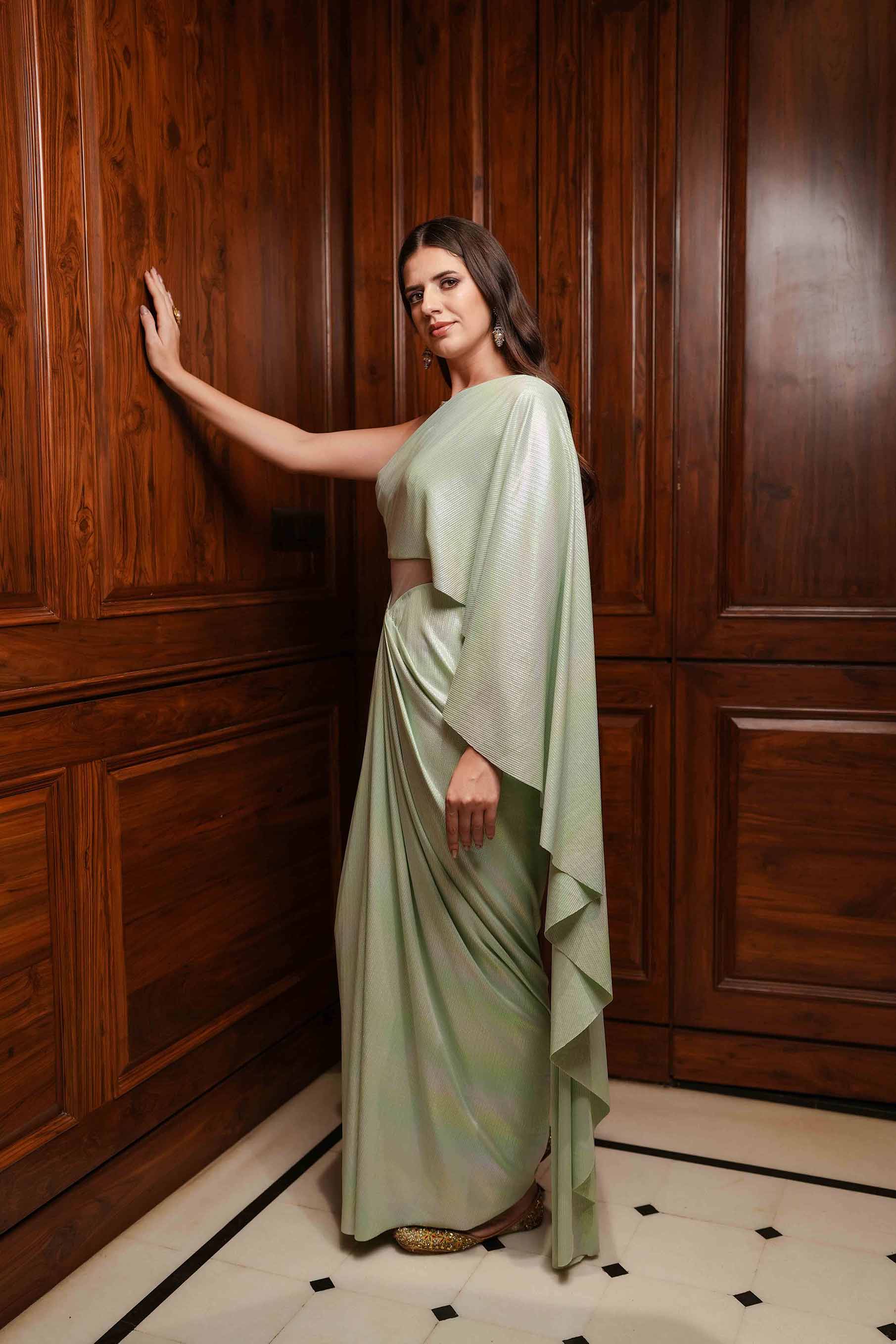 Aqua saree style draped gown.