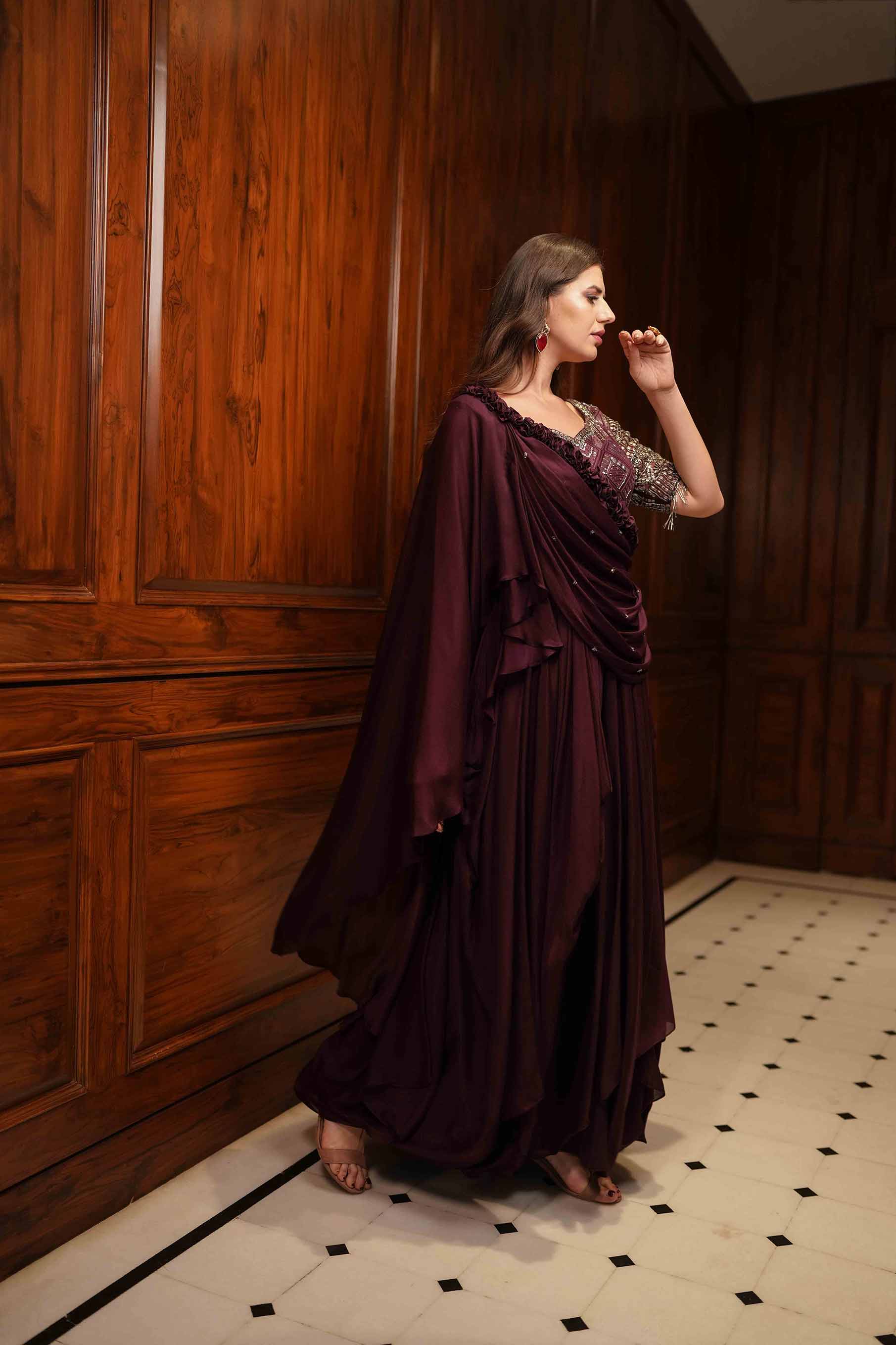 Plum cowl draped gown.