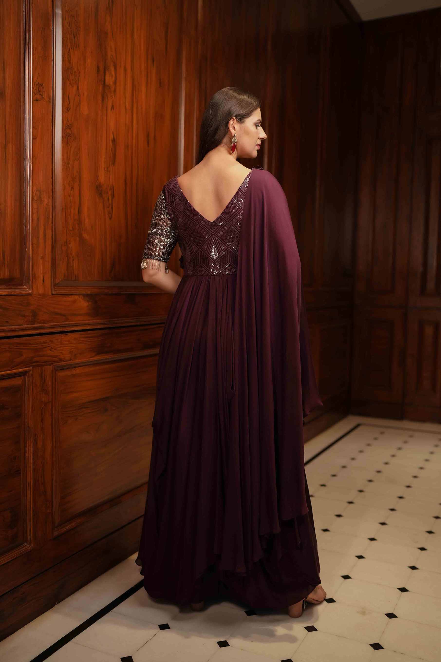 Plum cowl draped gown.