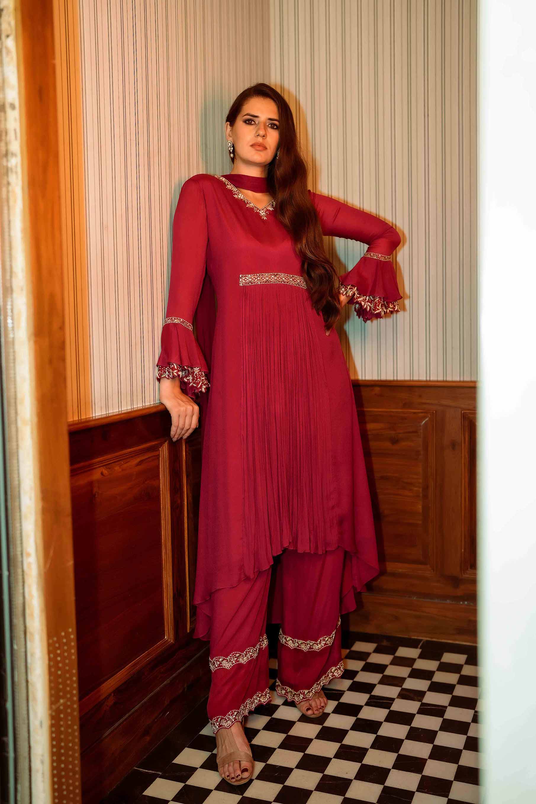 Cherry red fit and flared tunic with palazzo and dupatta set.