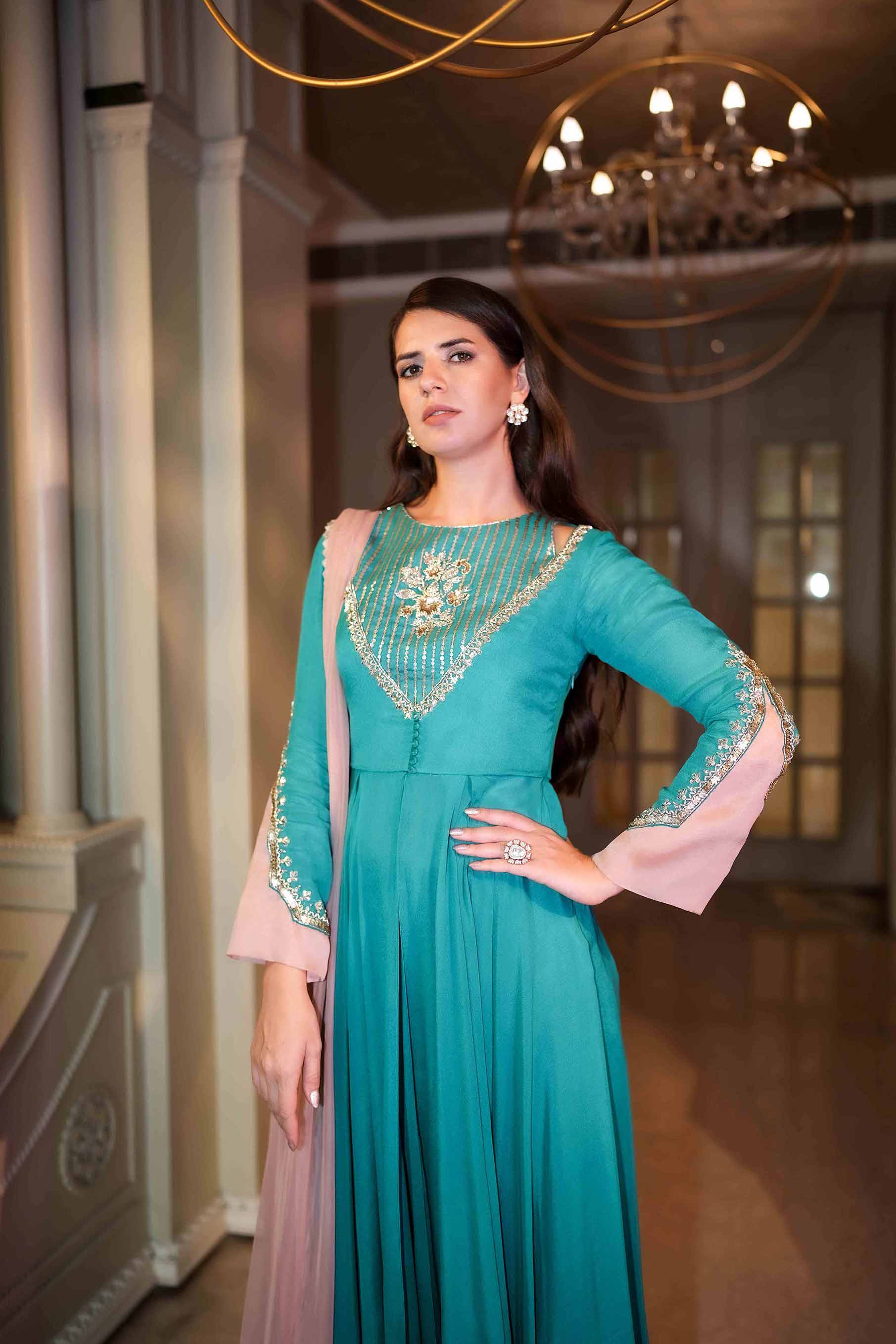 Teal green fit and flared tunic with palazzo and dupatta set.