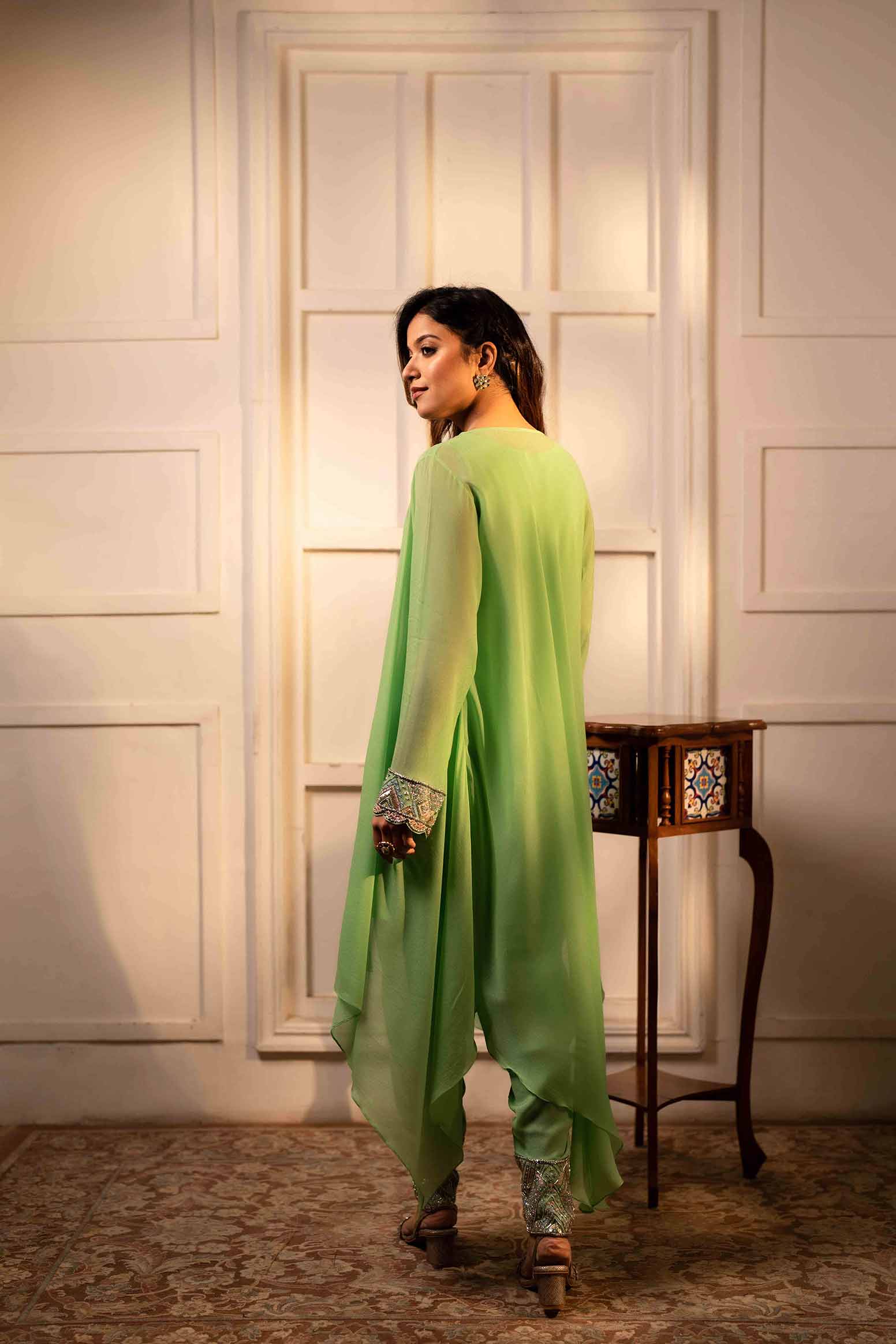 Pista green short tunic with shoti and flared jacket set.