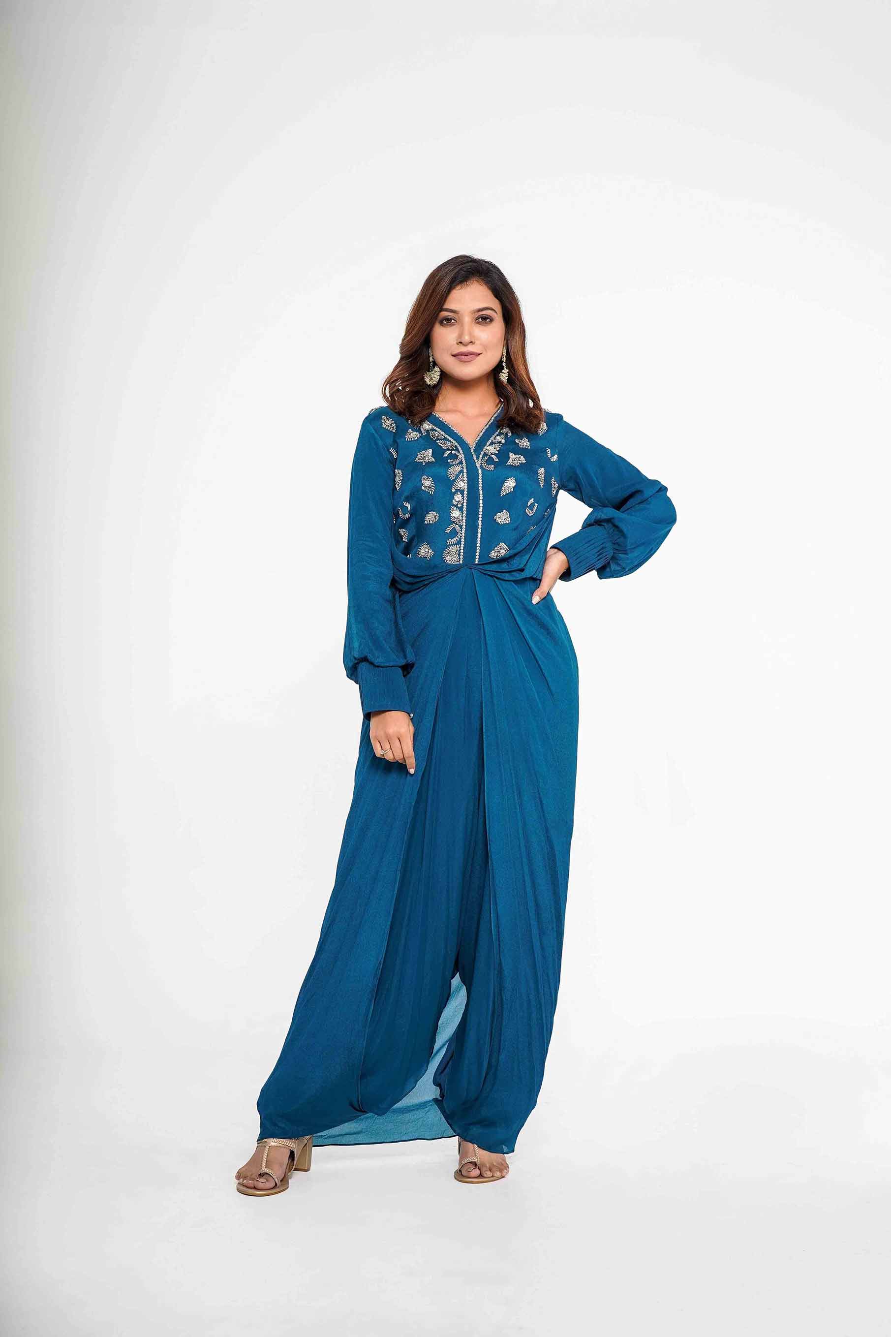 Teal Crepe Jumpsuit with an attached overlap panel.