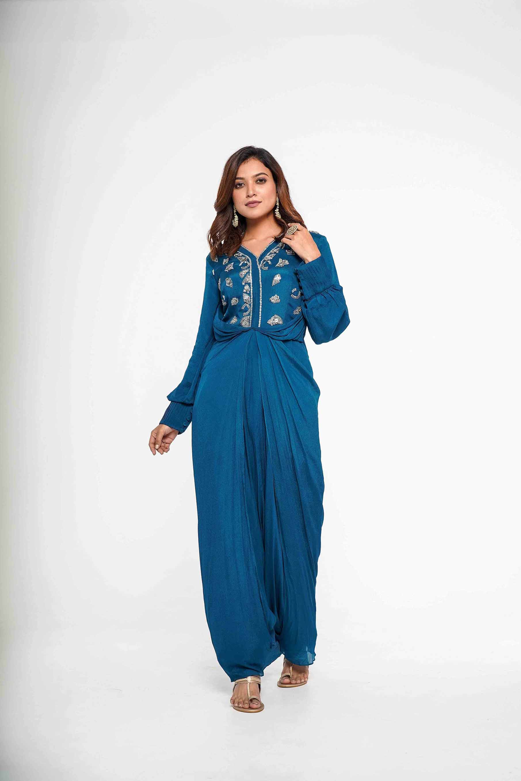 Teal Crepe Jumpsuit with an attached overlap panel.