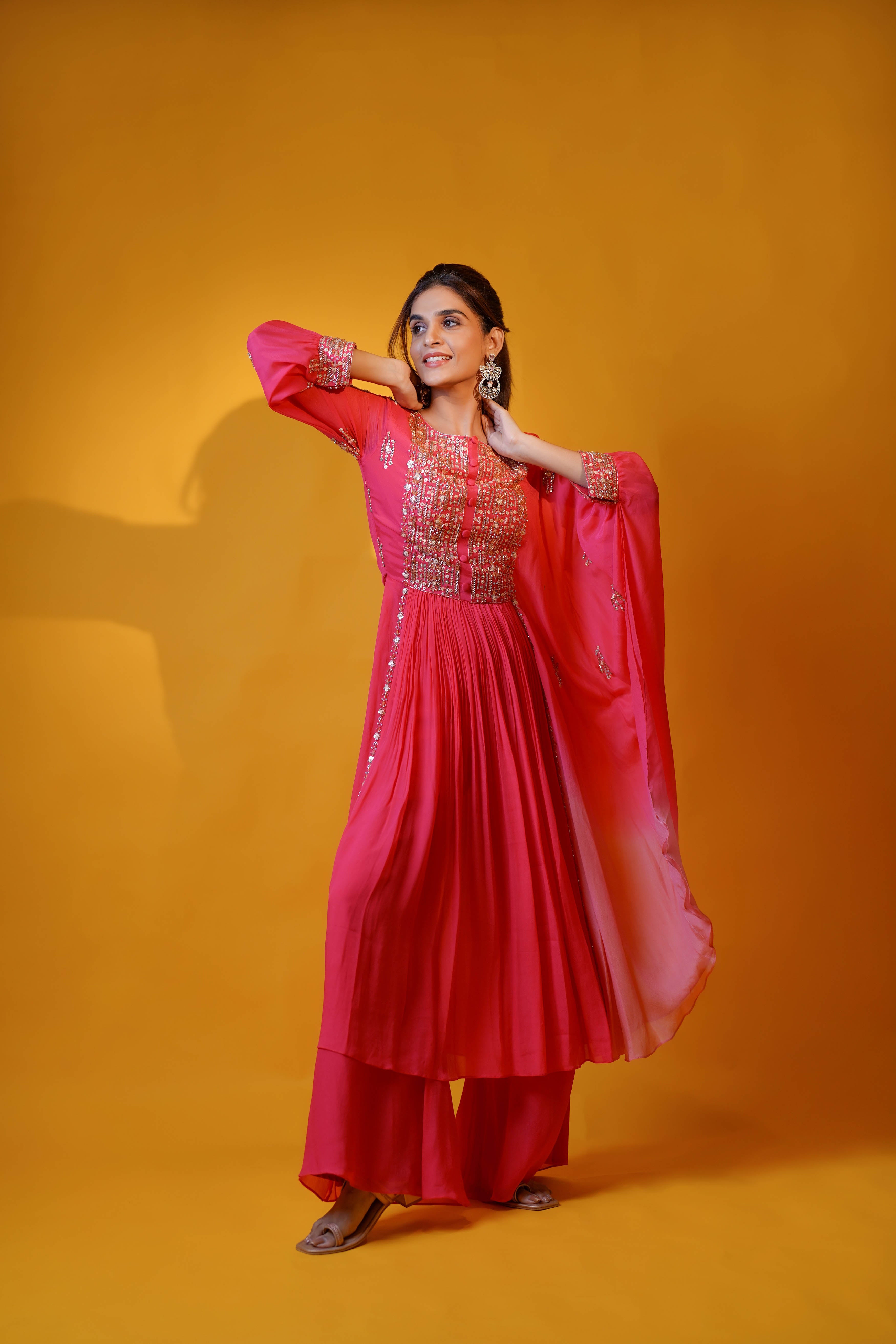 Hot pink fit and flare tunic with one side flared cuffs sleeves with palazzo set.