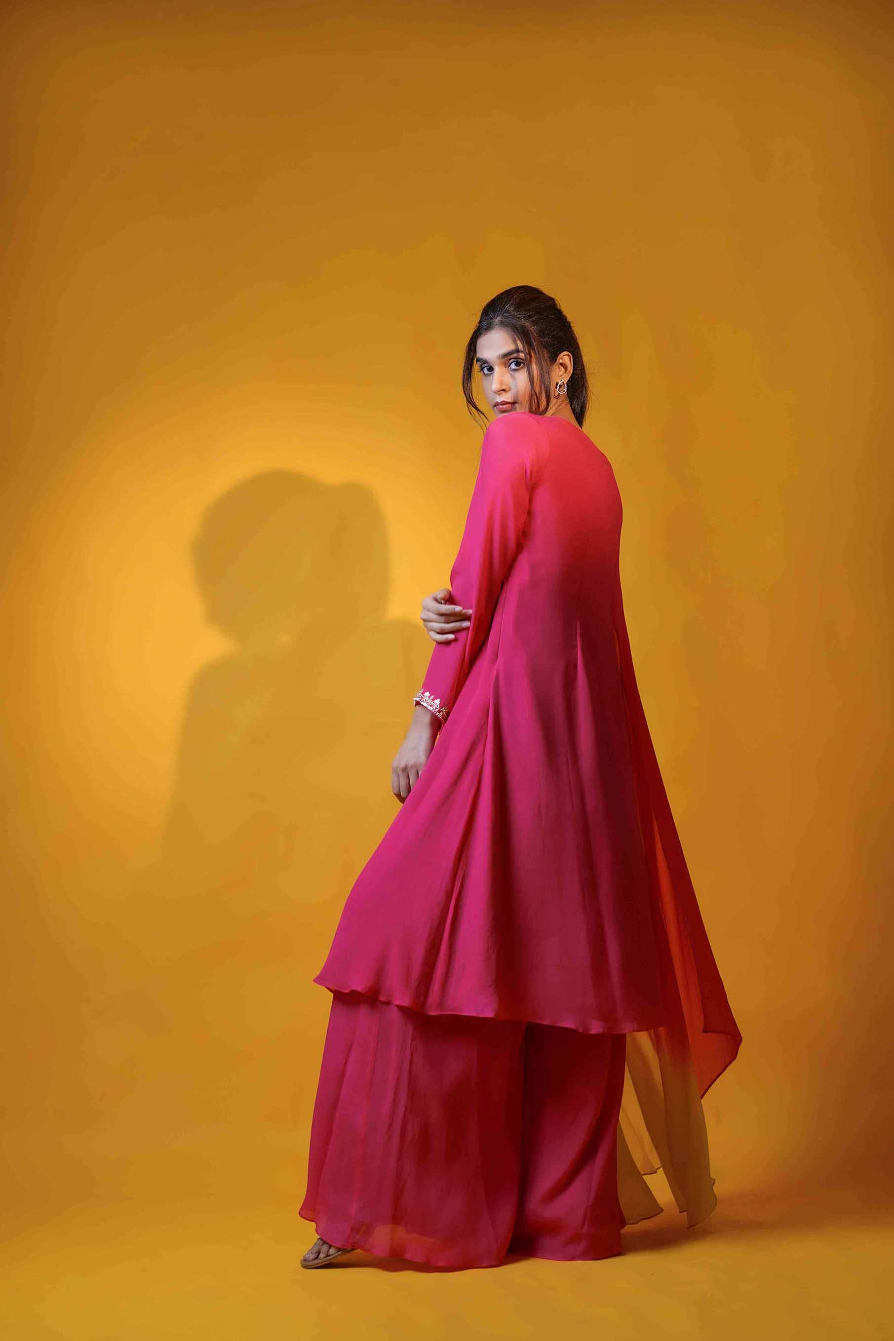 Bright pink A line tunic with one side drape.