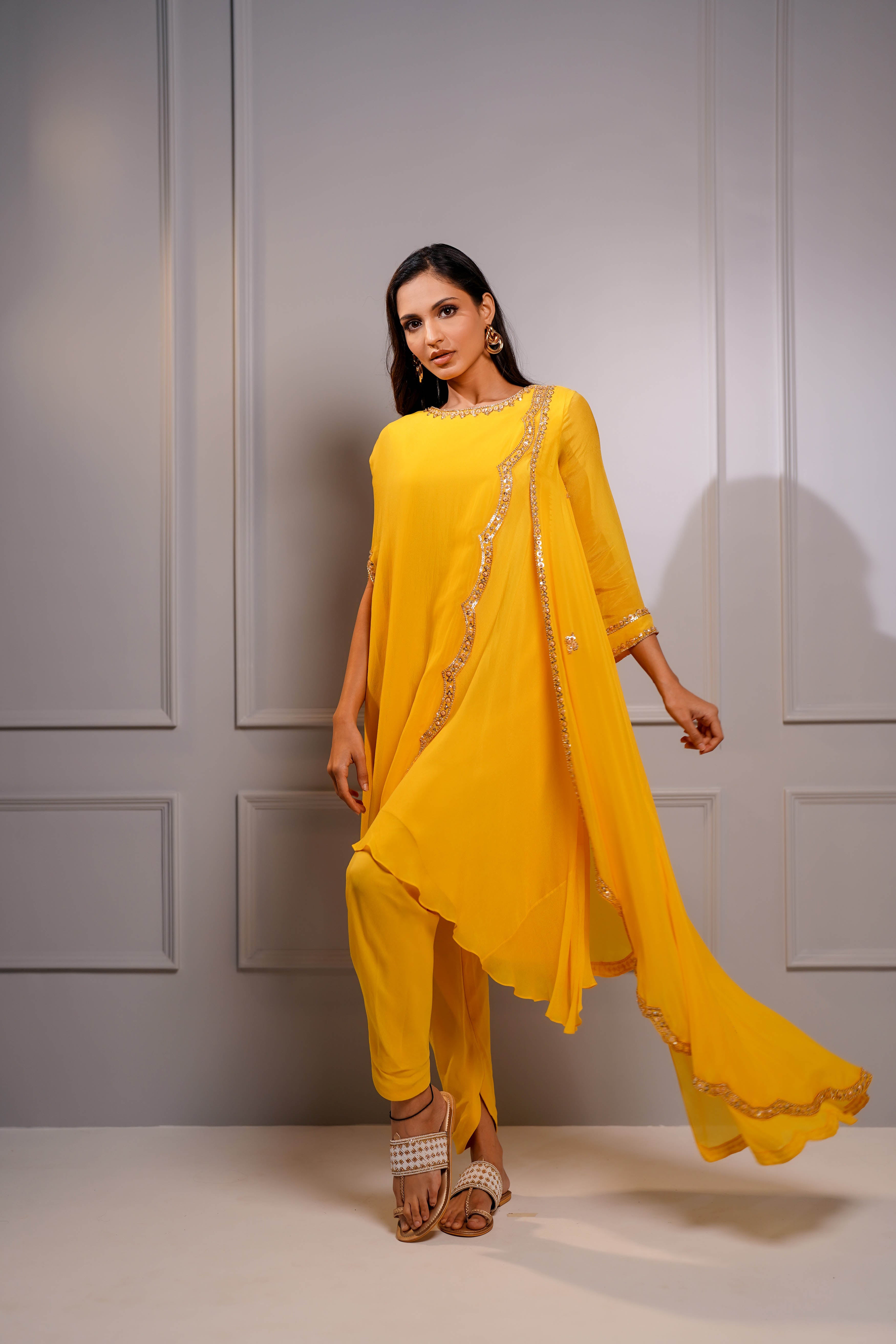 Mustard drape style tunic with dhoti pants sets.