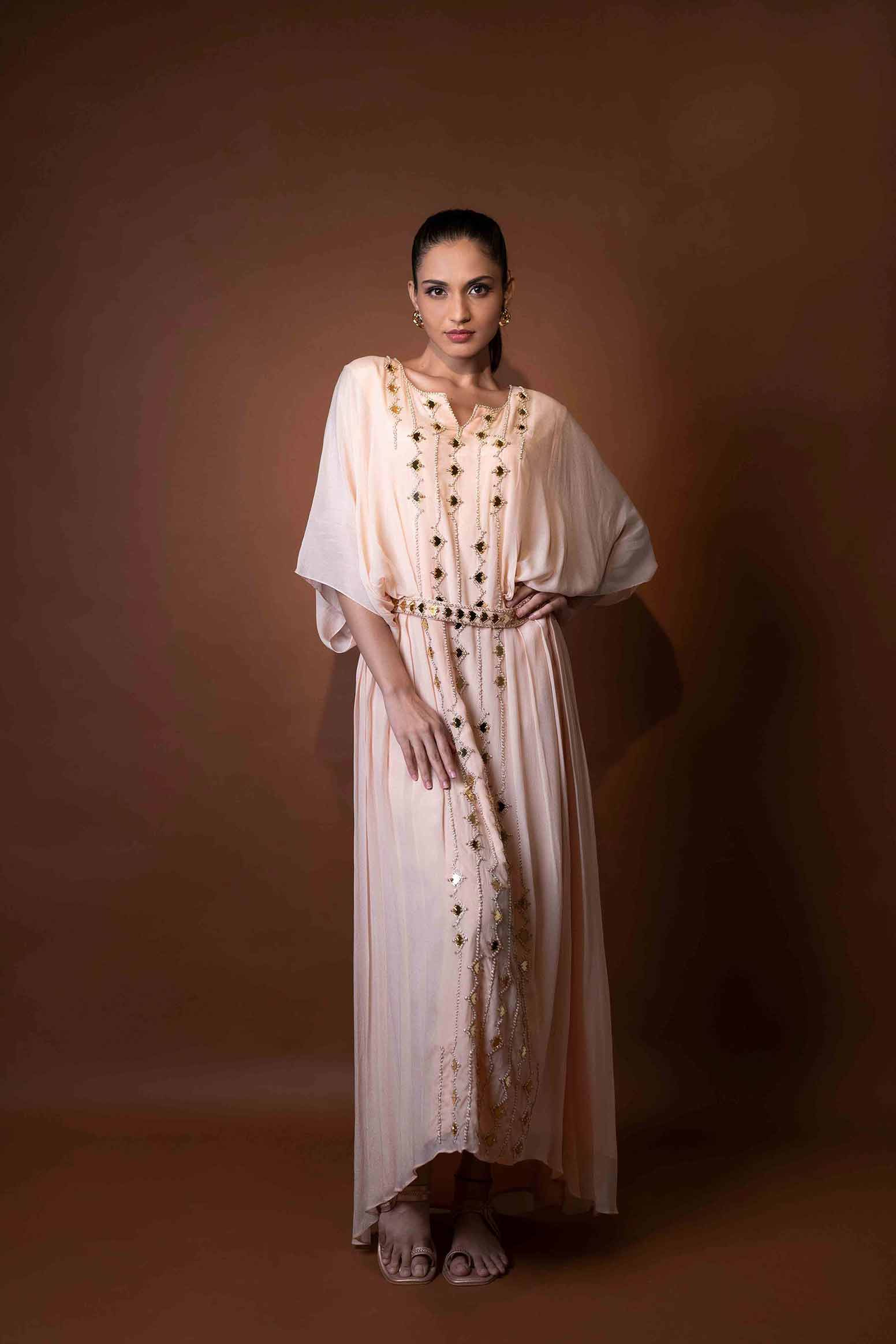 Peach crepe embroidered kaftan with belt.