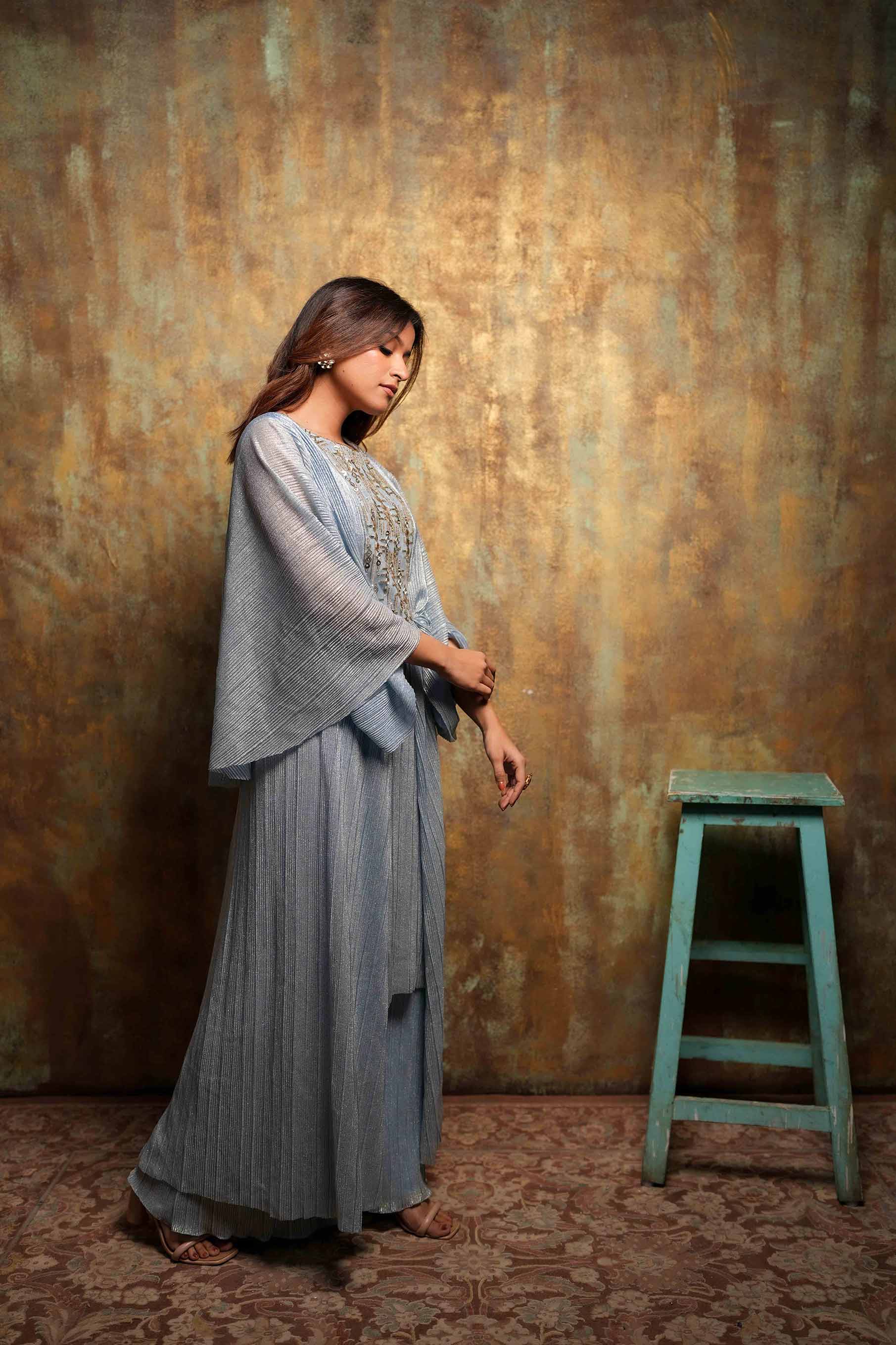 Ice blue cowl draped sleeves tunic with palazzo set.
